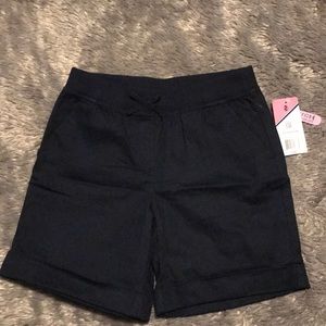 Navy blue stretch band shorts. Size 12 (girls)